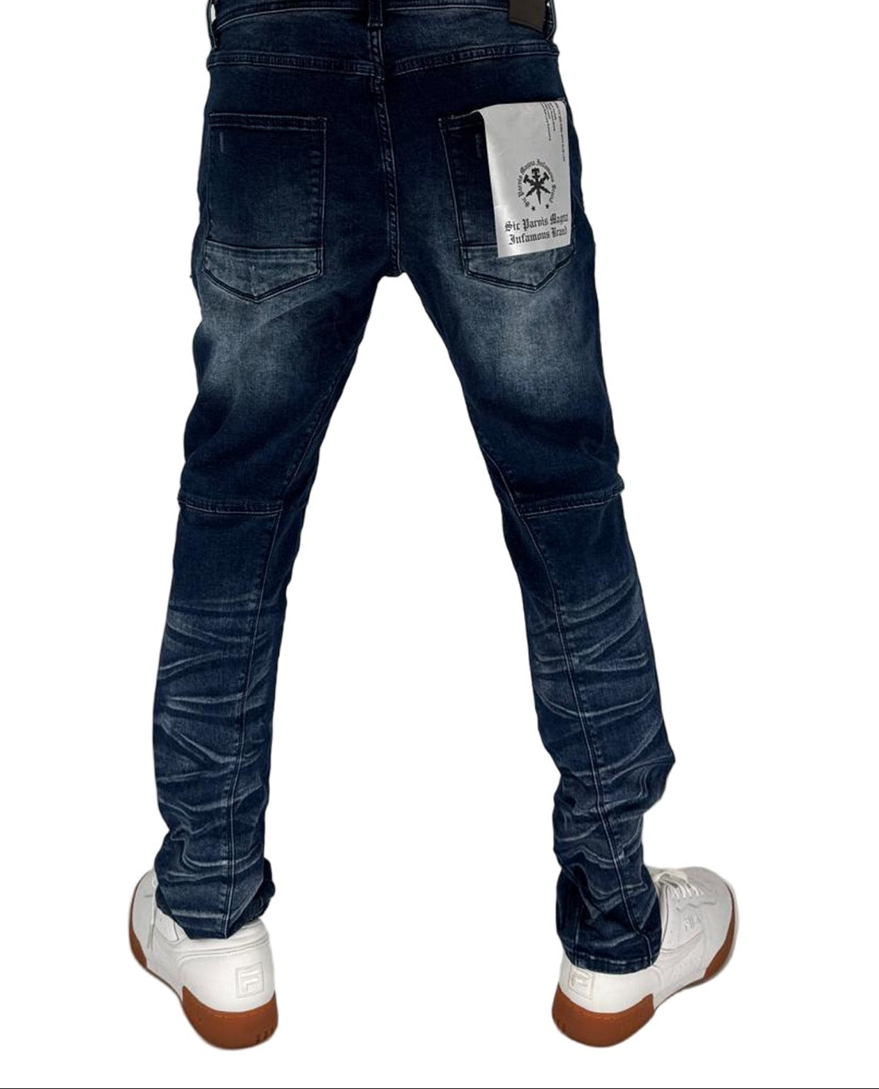 Elevate your everyday look with the Infamous Jeans in Dark Blue, a refined essential that defines effortless confidence and modern streetwear appeal. Crafted with precision from premium stretch-denim, these jeans deliver the perfect balance of structure, flexibility, and durability — designed to move with you through every moment.