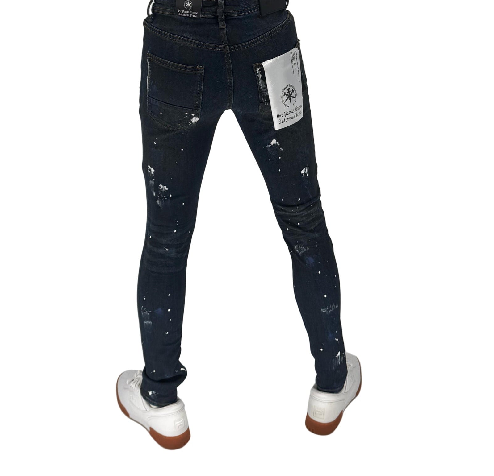 The Infamous Dark Blue Skinny Jeans bring timeless denim style with a sharp, modern edge. Designed with a deep indigo wash, these jeans offer a clean, versatile look that can be dressed up or down. The skinny fit hugs your legs for a streamlined silhouette, while the stretch fabric ensures comfort all day long.
