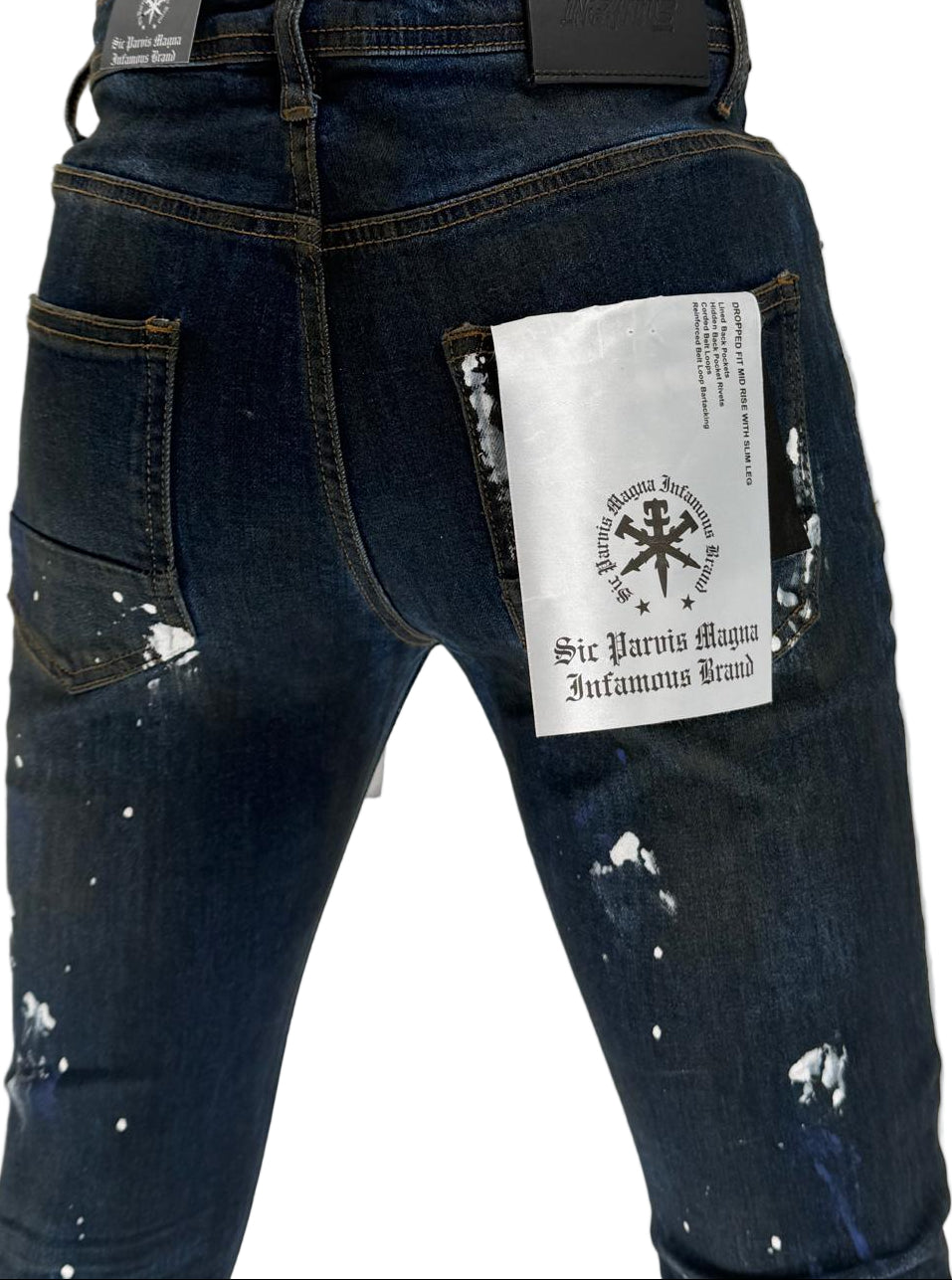 The Infamous Dark Blue Skinny Jeans bring timeless denim style with a sharp, modern edge. Designed with a deep indigo wash, these jeans offer a clean, versatile look that can be dressed up or down. The skinny fit hugs your legs for a streamlined silhouette, while the stretch fabric ensures comfort all day long.