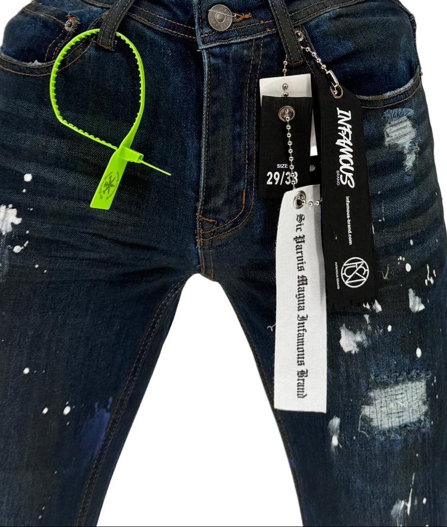 The Infamous Dark Blue Skinny Jeans bring timeless denim style with a sharp, modern edge. Designed with a deep indigo wash, these jeans offer a clean, versatile look that can be dressed up or down. The skinny fit hugs your legs for a streamlined silhouette, while the stretch fabric ensures comfort all day long.