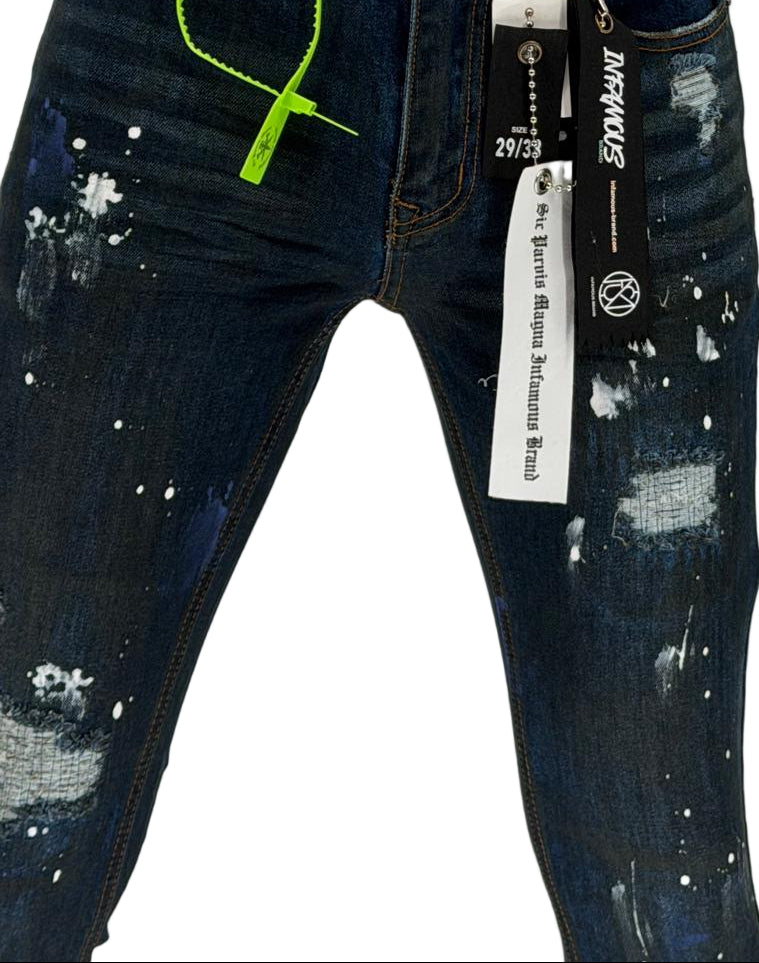 The Infamous Dark Blue Skinny Jeans bring timeless denim style with a sharp, modern edge. Designed with a deep indigo wash, these jeans offer a clean, versatile look that can be dressed up or down. The skinny fit hugs your legs for a streamlined silhouette, while the stretch fabric ensures comfort all day long.