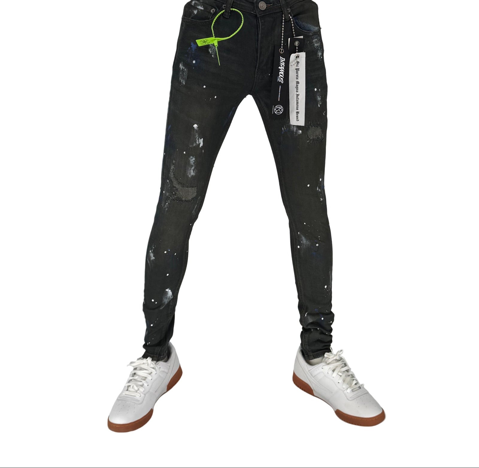 Step up your streetwear game with the Infamous Green Tint Skinny Jeans. Designed for those who aren't afraid to stand out, these slim-fit jeans combine urban attitude with a fresh twist. The subtle green tint adds a unique color pop to your wardrobe, while the stretch denim ensures a snug, comfortable fit that moves with you.