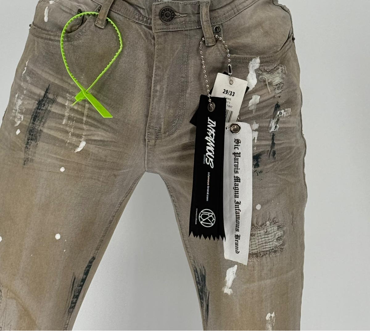 Upgrade your denim rotation with the Infamous Skinny Fit Jeans in Ice Grey. These jeans feature a modern skinny fit that tapers through the leg, delivering a sharp, contemporary silhouette without sacrificing comfort. 