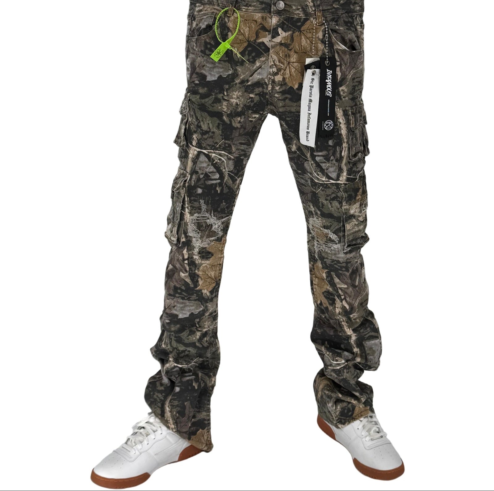 Stand out and stay sharp with the Infamous Stacked Jeans in Hunter Camo – built for bold moves and everyday dominance. These jeans feature a signature stacked-leg design with an elongated inseam that creates a stylish stack at the ankle, perfect for showcasing your favorite kicks.