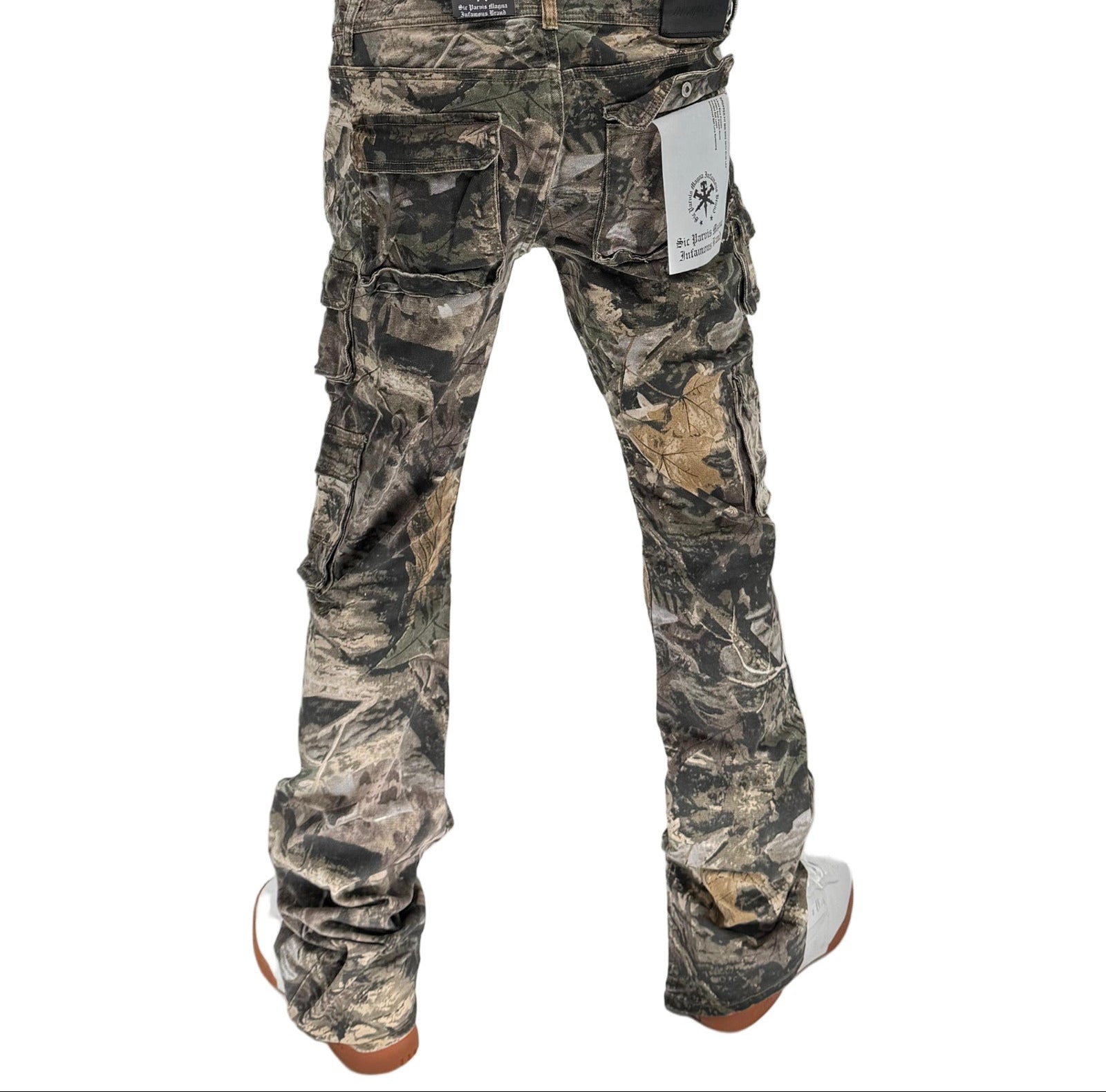 Stand out and stay sharp with the Infamous Stacked Jeans in Hunter Camo – built for bold moves and everyday dominance. These jeans feature a signature stacked-leg design with an elongated inseam that creates a stylish stack at the ankle, perfect for showcasing your favorite kicks.