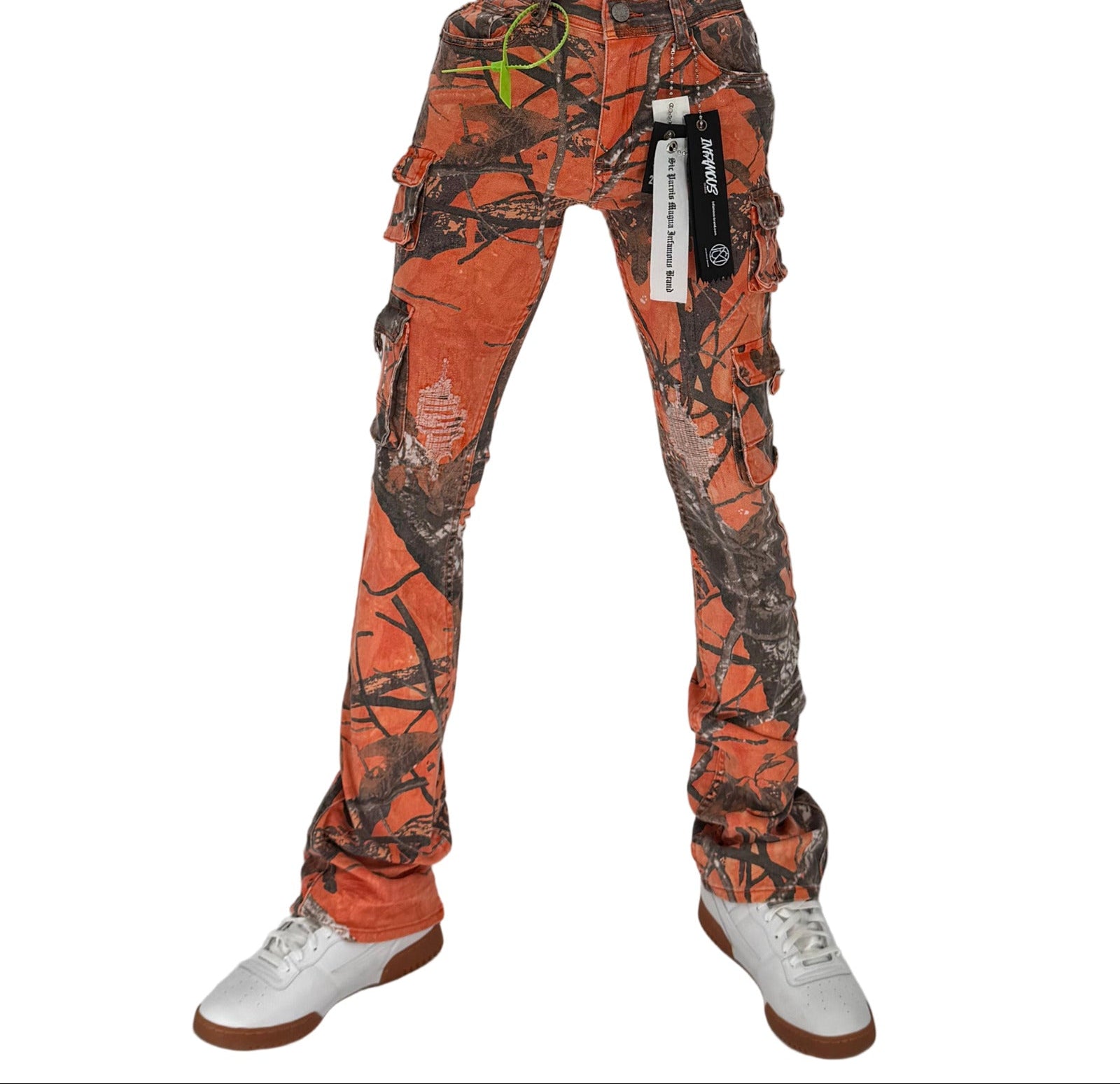 Turn up the volume on your streetwear game with the Infamous Stacked Jeans in Orange Camo – a bold, unapologetic take on a modern classic. Featuring a stacked-leg design with extra length for that signature stacked look, these jeans bring standout energy to any outfit.