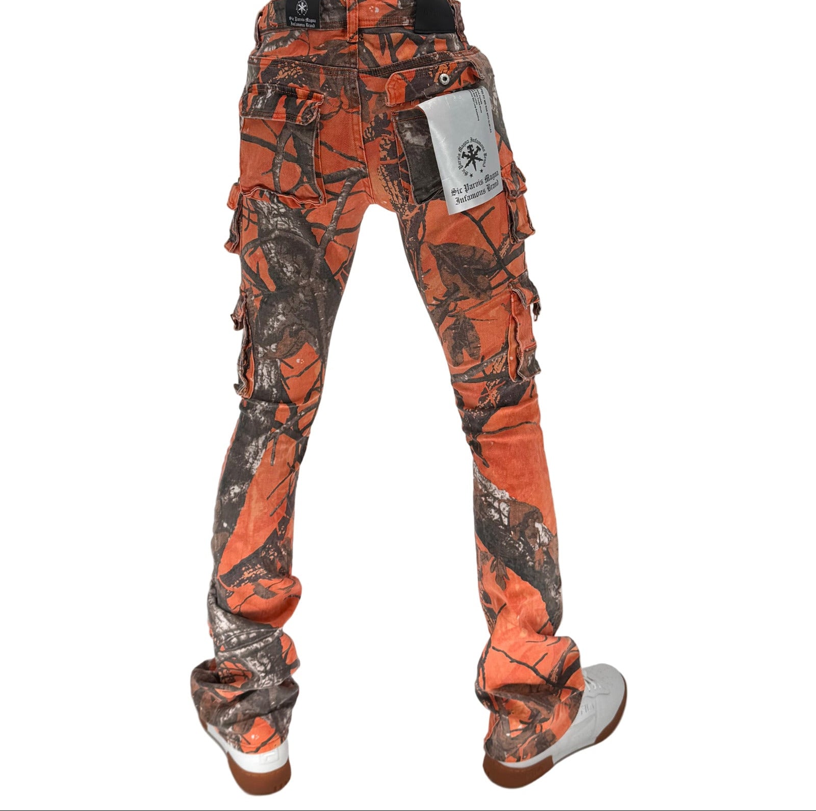 Turn up the volume on your streetwear game with the Infamous Stacked Jeans in Orange Camo – a bold, unapologetic take on a modern classic. Featuring a stacked-leg design with extra length for that signature stacked look, these jeans bring standout energy to any outfit.