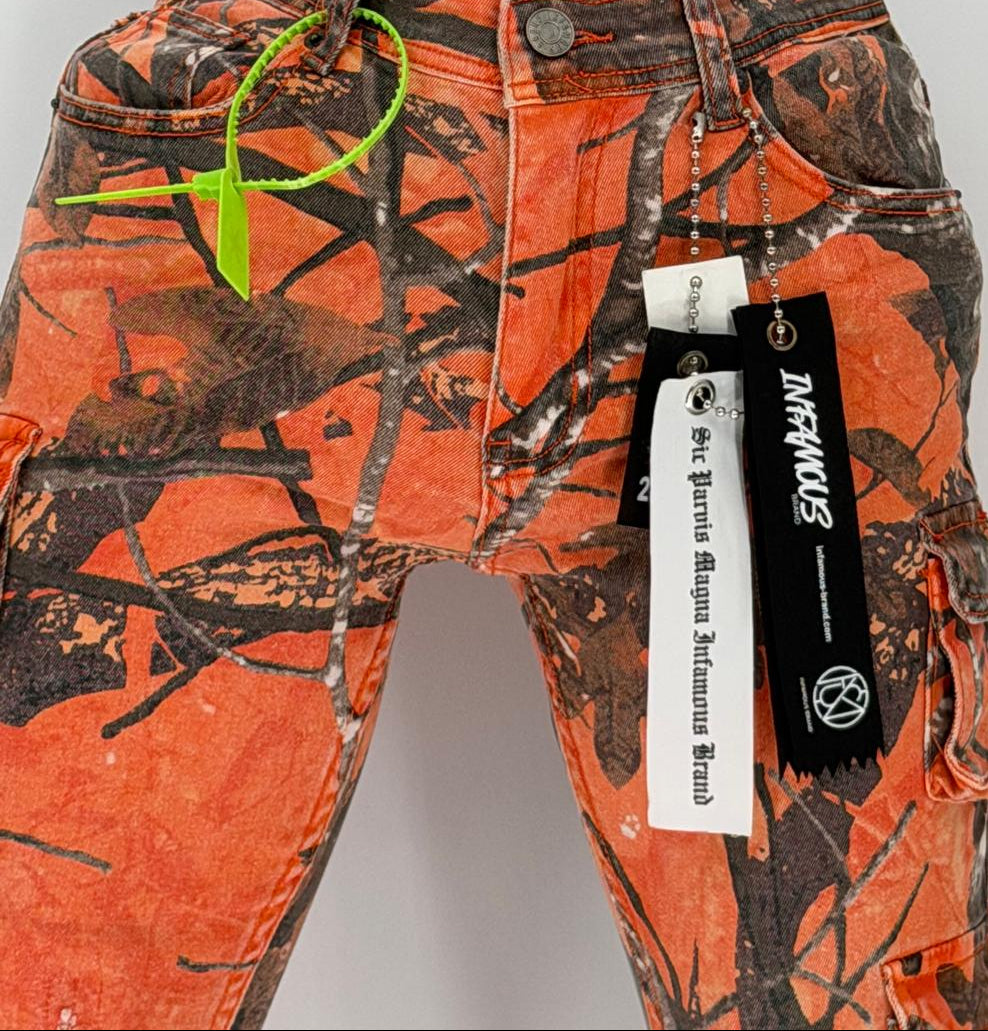Turn up the volume on your streetwear game with the Infamous Stacked Jeans in Orange Camo – a bold, unapologetic take on a modern classic. Featuring a stacked-leg design with extra length for that signature stacked look, these jeans bring standout energy to any outfit.