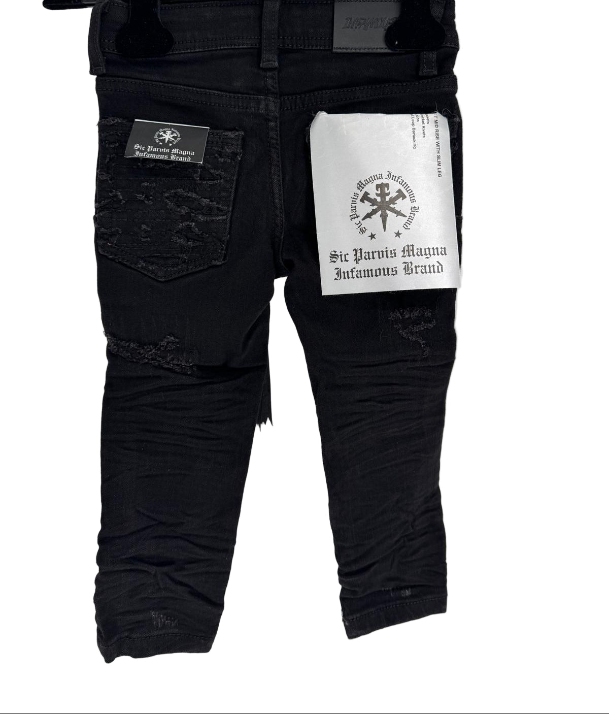 Bring bold street energy to your kid’s everyday style with the Infamous Jet Black Jeans. Designed for comfort, movement, and edge, these jeans feature a sleek distressed finish that captures the authentic streetwear vibe. 