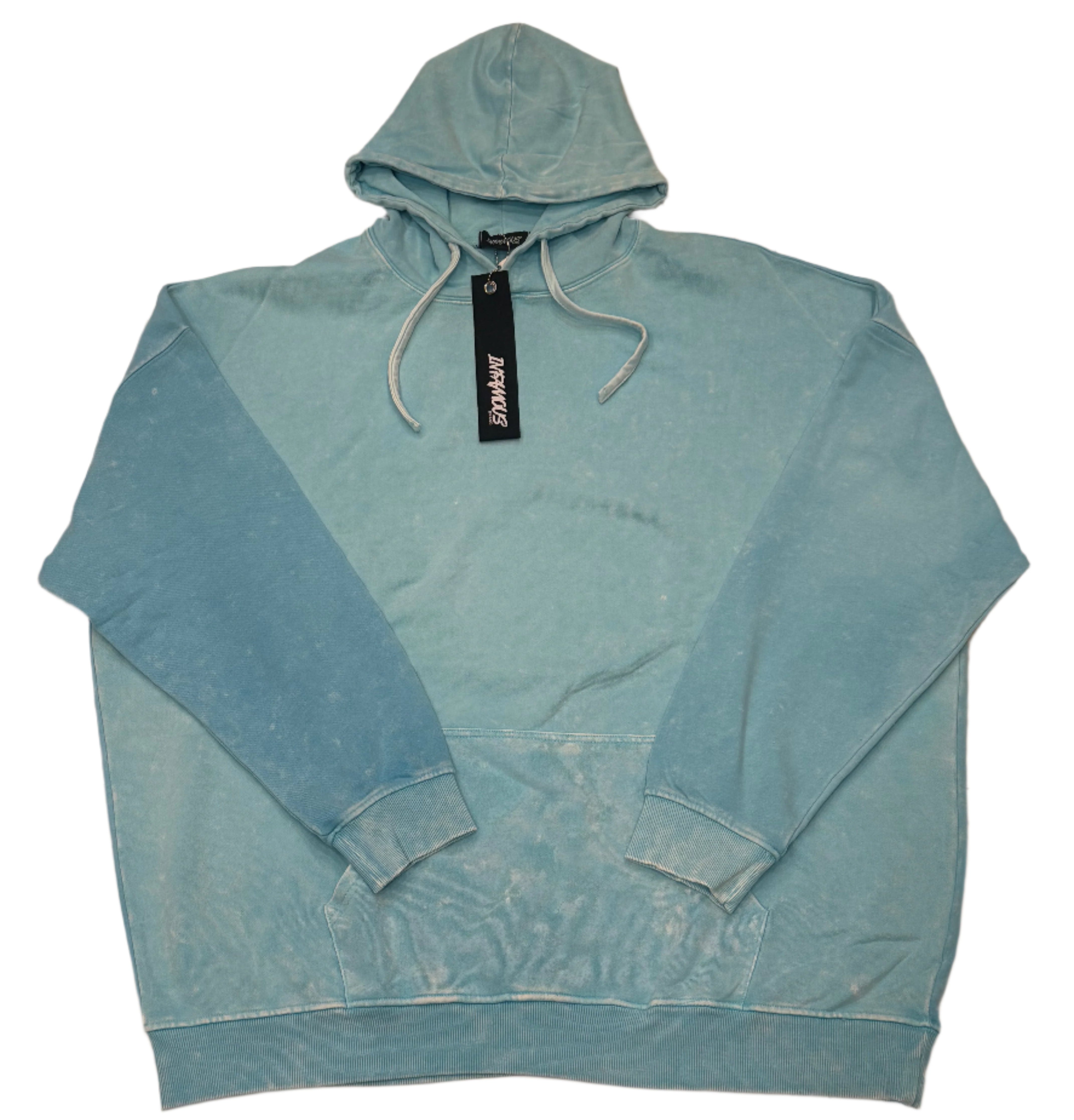 Step into effortless style with the Infamous Basic Tie Dye Hoodie in Tiffany Blue — where comfort meets streetwear luxury. Crafted with precision, this hoodie delivers the perfect blend of softness, structure, and standout design.