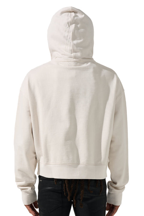 SERENEDE® LEGACY Ivory Hoodie with black outlined chest branding, kangaroo pocket, and relaxed fit.