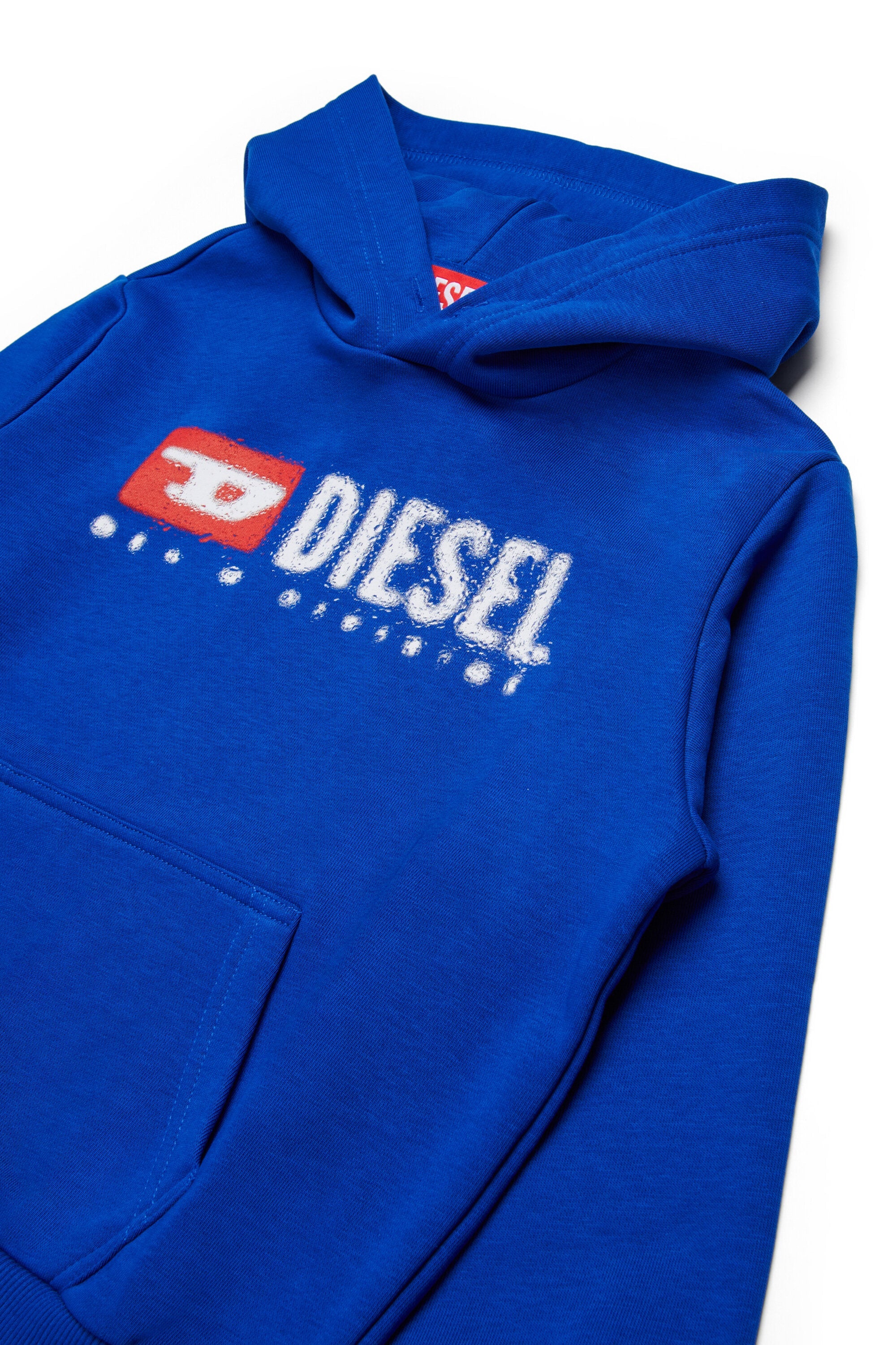 Diesel Denim Division Oversized Hoodie in white with water-splashed logo, hood, long sleeves, and pouch pocket.