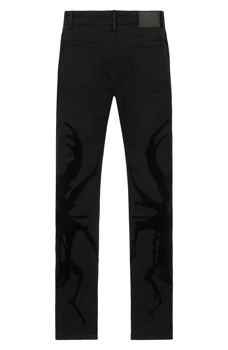 RTA black skinny jeans with tonal side graphics and modern stretch denim silhouette