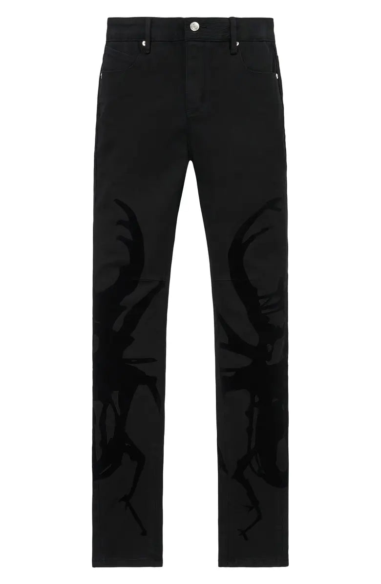 RTA black skinny jeans with tonal side graphics and modern stretch denim silhouette