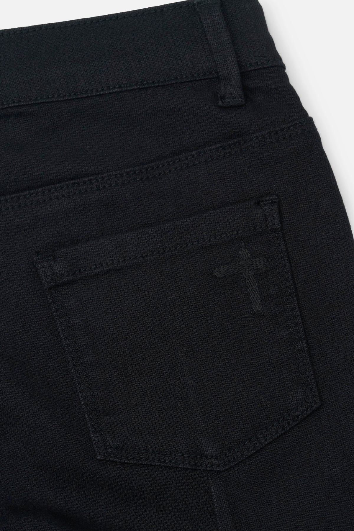 RtA Carlo skinny jeans in black multi cross with cross embroidery and pin-tuck dagger seams.