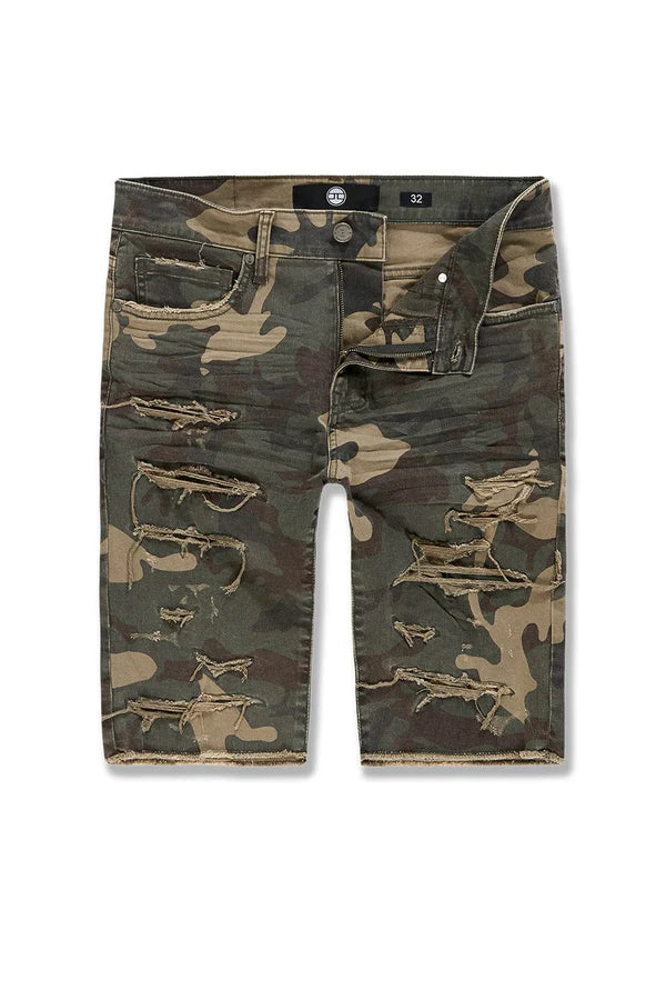 Redefine casual with these Garment-Dyed Camo Twill Shorts, crafted for those who appreciate authentic design and elevated edge. Featuring a regular rise and a 10.5" inseam, they deliver a classic OG fit that hits right at the knee. The heavily shredded detailing with fused shreds and 3D baked whiskers add a worn-in look, while the raw edge hem and exposed weft at the knees give these shorts a distinctly rugged finish.

Built from a stretch-infused cotton twill for comfort and durability, this pair combines 