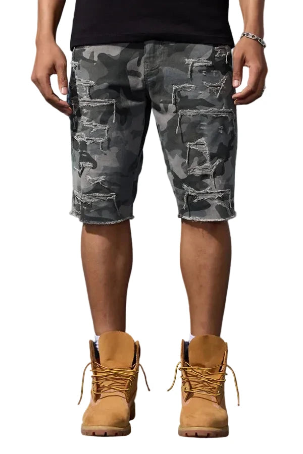 The OG – Tulsa Camo Twill Shorts deliver a bold take on the classic knee-length OG fit. Designed with heavy shredding, textured detailing, and a worn-in finish, these shorts bring standout streetwear energy to any look. Crafted from stretch twill for all-day comfort, they keep a structured fit while adding rugged character with every detail.