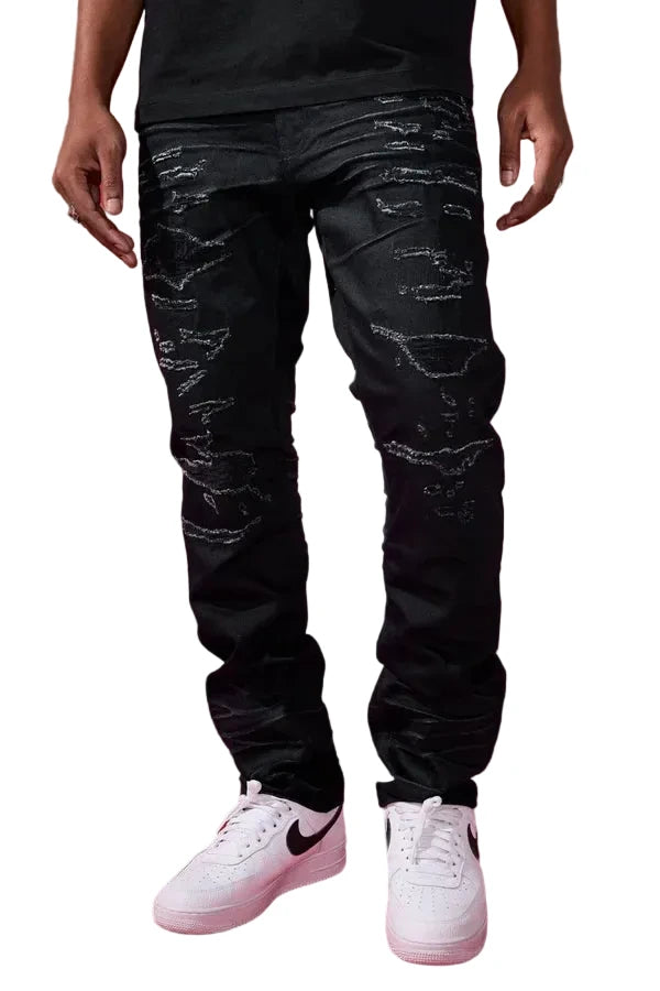 Dyckman straight fit denim jeans in polished black with glossy coated finish and rip-and-repair detailing.
