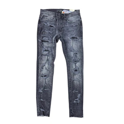 Extended-length flare denim pants with stacked leg, 3D baked wrinkles, and rip-and-repair detailing