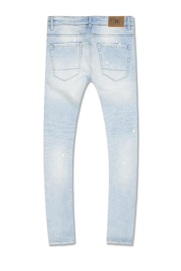  Skinny fit jeans with rip and repair details, deep pockets, and stretch denim for comfort.