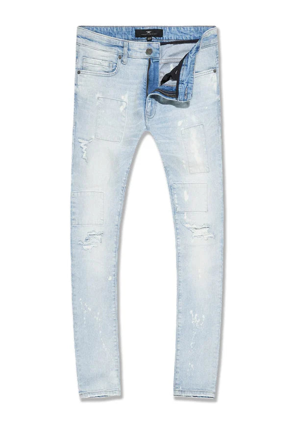  Skinny fit jeans with rip and repair details, deep pockets, and stretch denim for comfort.