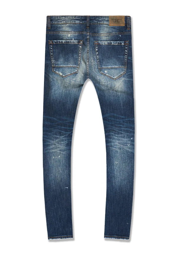  Skinny fit jeans with rip and repair details, deep pockets, and stretch denim for comfort.