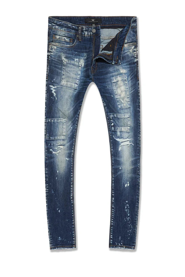  Skinny fit jeans with rip and repair details, deep pockets, and stretch denim for comfort.