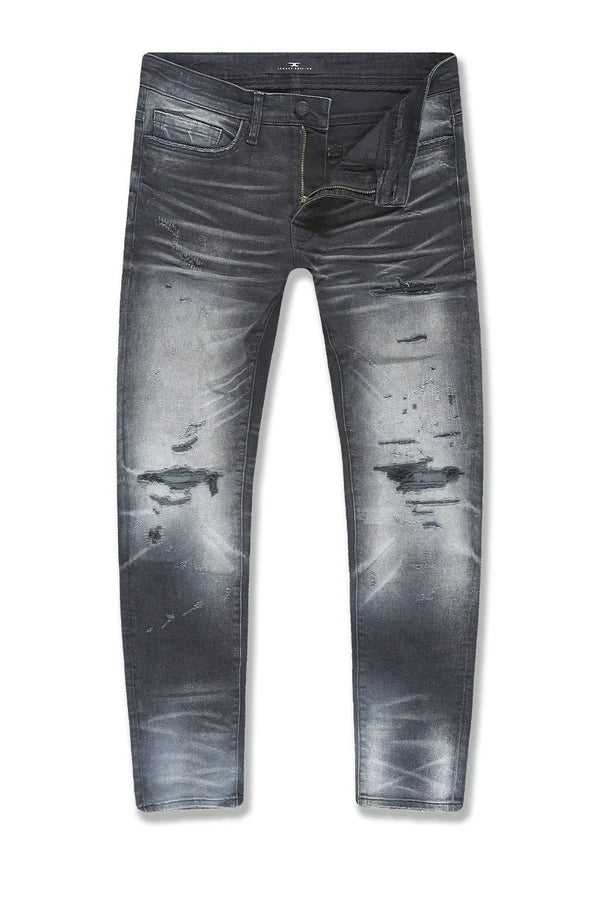 Sean Slim Taper Fit Jeans with super-stretch fabric, rip-and-repair detailing, and unique distressing