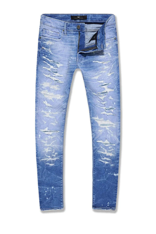 The Sean slim taper stretch jeans with rip and repair and unique distressing