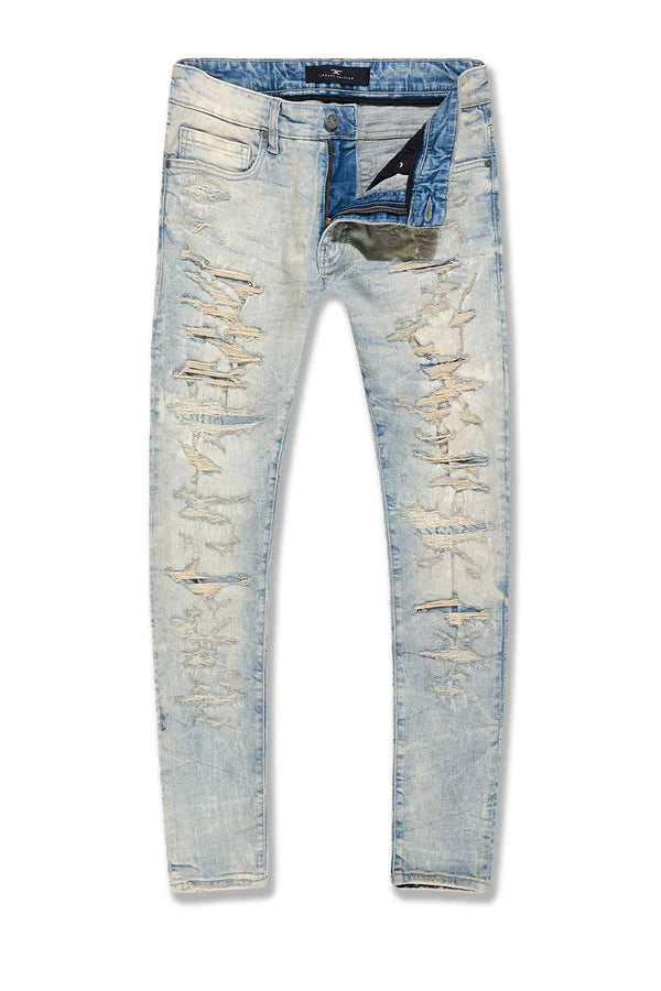 The Sean slim taper jeans with rip and repair distressing and stretch fit