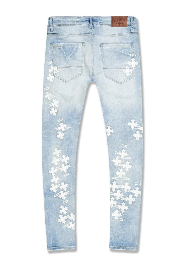 Sean Slim Taper Fit Jeans with “See You In Paradise” print, rip and repair design, and tapered leg.