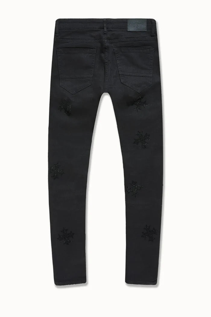 The Men's Slim Taper Limelight Denim Pant by Jordan Craig offers a contemporary fit with a tailored taper that enhances silhouette without sacrificing comfort. Crafted from durable denim, these pants are designed to maintain shape and withstand everyday wear, making them a reliable choice for modern casual or smart-casual wardrobes. The refined cut ensures ease of movement while providing a sleek, polished appearance suitable for versatile styling.