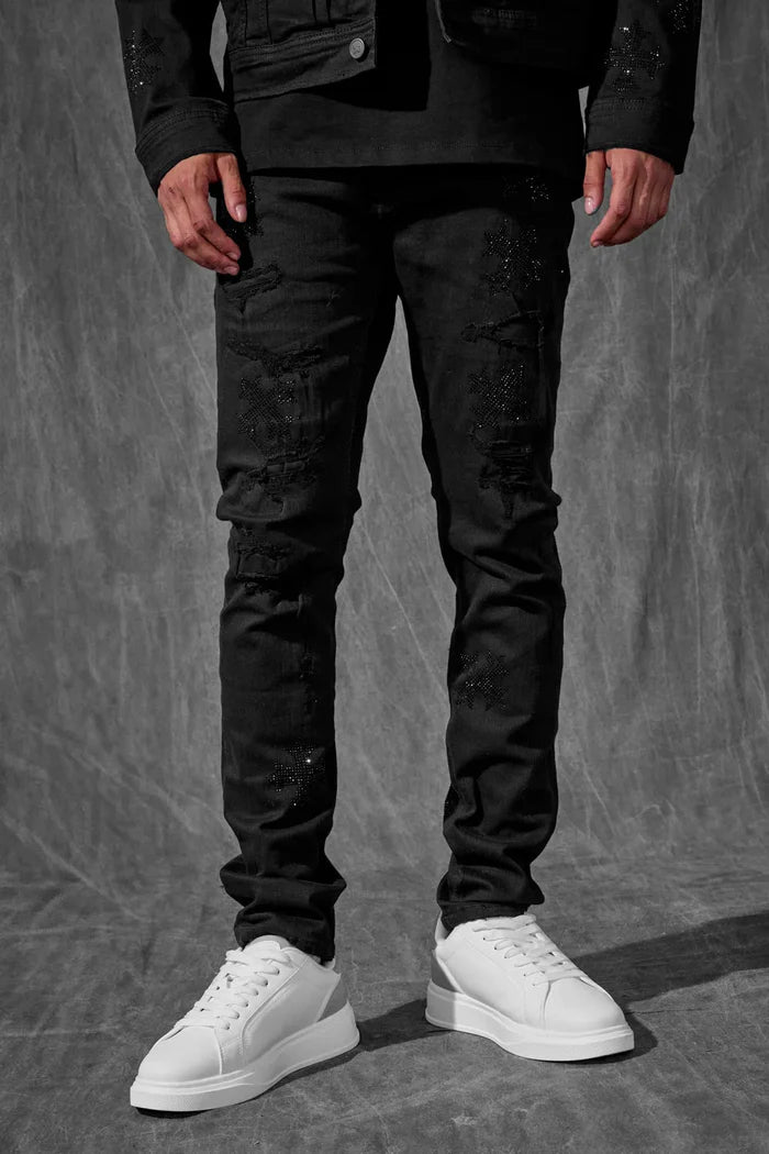 The Men's Slim Taper Limelight Denim Pant by Jordan Craig offers a contemporary fit with a tailored taper that enhances silhouette without sacrificing comfort. Crafted from durable denim, these pants are designed to maintain shape and withstand everyday wear, making them a reliable choice for modern casual or smart-casual wardrobes. The refined cut ensures ease of movement while providing a sleek, polished appearance suitable for versatile styling.