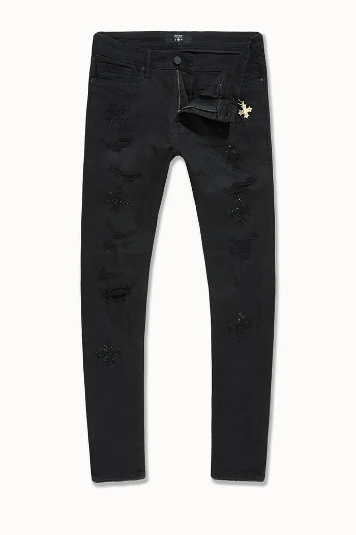 The Men's Slim Taper Limelight Denim Pant by Jordan Craig offers a contemporary fit with a tailored taper that enhances silhouette without sacrificing comfort. Crafted from durable denim, these pants are designed to maintain shape and withstand everyday wear, making them a reliable choice for modern casual or smart-casual wardrobes. The refined cut ensures ease of movement while providing a sleek, polished appearance suitable for versatile styling.