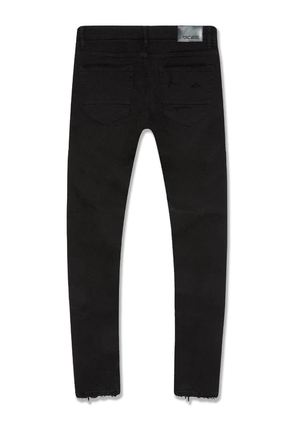  Slim taper fit super stretch jeans with rip-and-repair styling, fused shreds, and vintage distressing