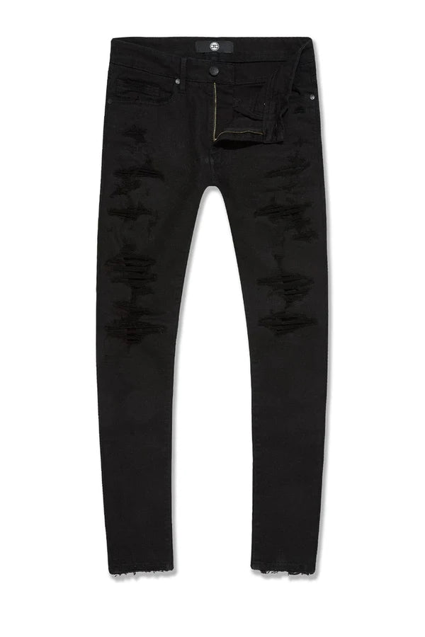  Slim taper fit super stretch jeans with rip-and-repair styling, fused shreds, and vintage distressing