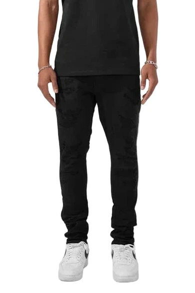 Alkaline Denim slim taper fit jeans in jet black with rip-and-repair detailing and vintage-inspired distressing.