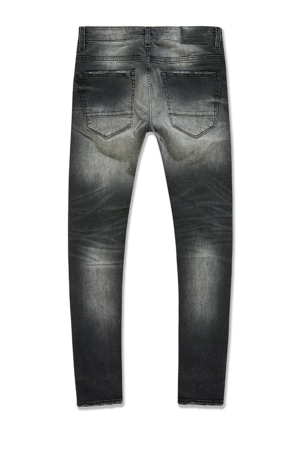 Jordan Craig Newport denim jeans in slim taper fit with distressed rip-and-repair details, 3D wrinkles, and modern stretch fabric
