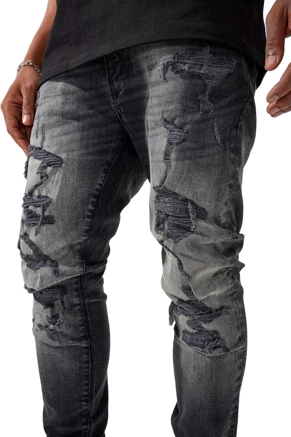 Jordan Craig Newport denim jeans in slim taper fit with distressed rip-and-repair details, 3D wrinkles, and modern stretch fabric
