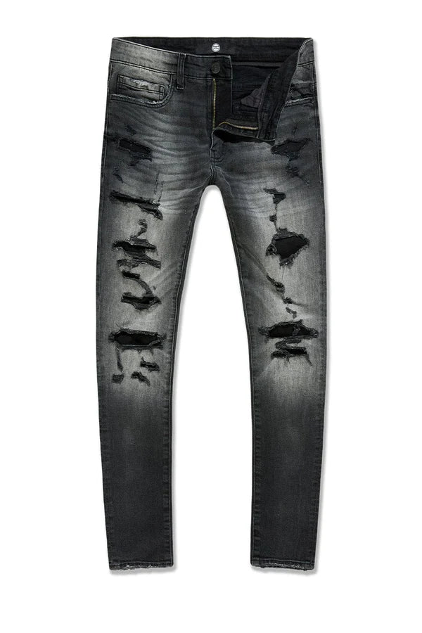 Jordan Craig Newport denim jeans in slim taper fit with distressed rip-and-repair details, 3D wrinkles, and modern stretch fabric