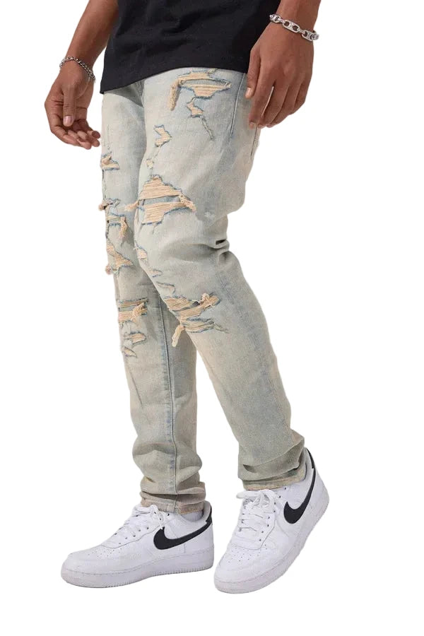 Jordan Craig Newport denim jeans in slim taper fit with distressed rip-and-repair details, 3D wrinkles, and modern stretch fabric
