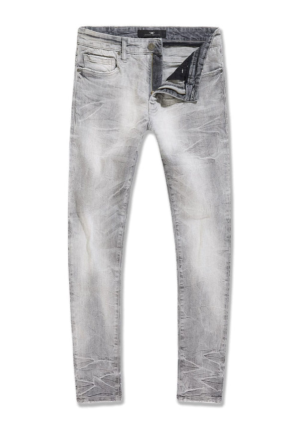 Slim taper fit jeans with 3D baked wrinkles, unique wash effect, and super stretch cotton Lycra fabric