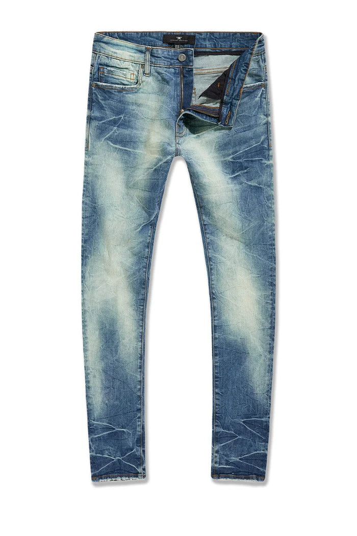 Slim taper fit jeans with 3D baked wrinkles, unique wash effect, and super stretch cotton Lycra fabric
