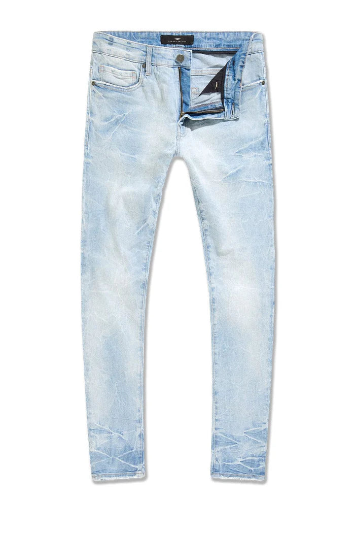 Slim taper fit jeans with 3D baked wrinkles, unique wash effect, and super stretch cotton Lycra fabric