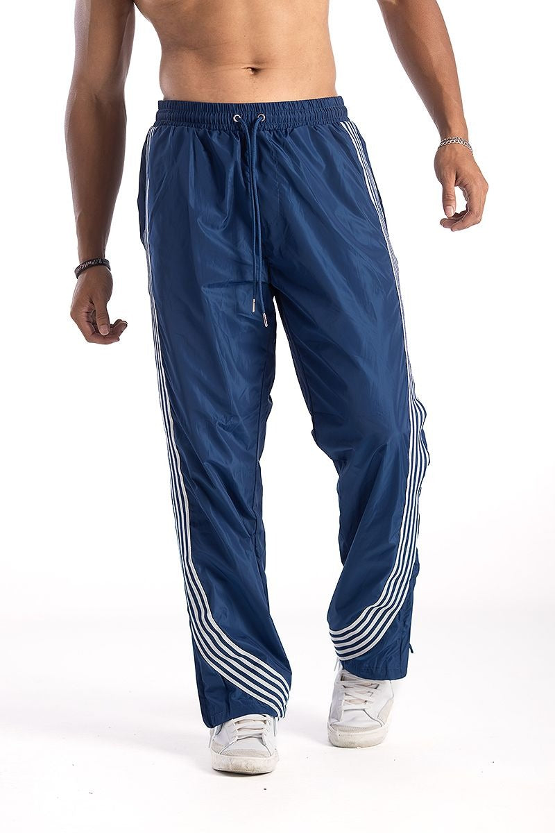 Navy nylon relax pants with stripe detail