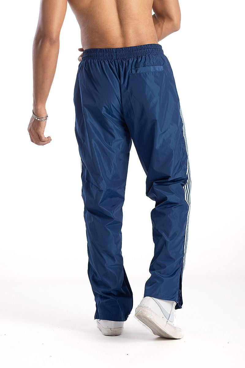 Navy nylon relax pants with stripe detail
