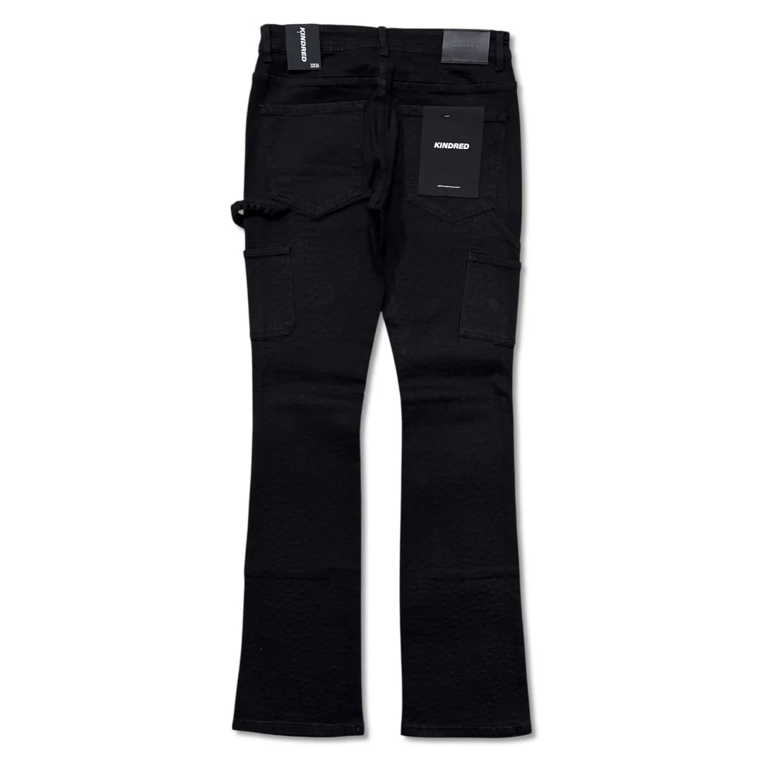 Make a bold statement with the Men's Rhinestone Denim Stacked Jeans in Black Kindred. Designed with a stacked fit, these jeans feature rhinestone detailing that adds standout style to any look. The sleek black finish makes them versatile for both casual and elevated outfits. A perfect choice for modern streetwear with a touch of edge.
