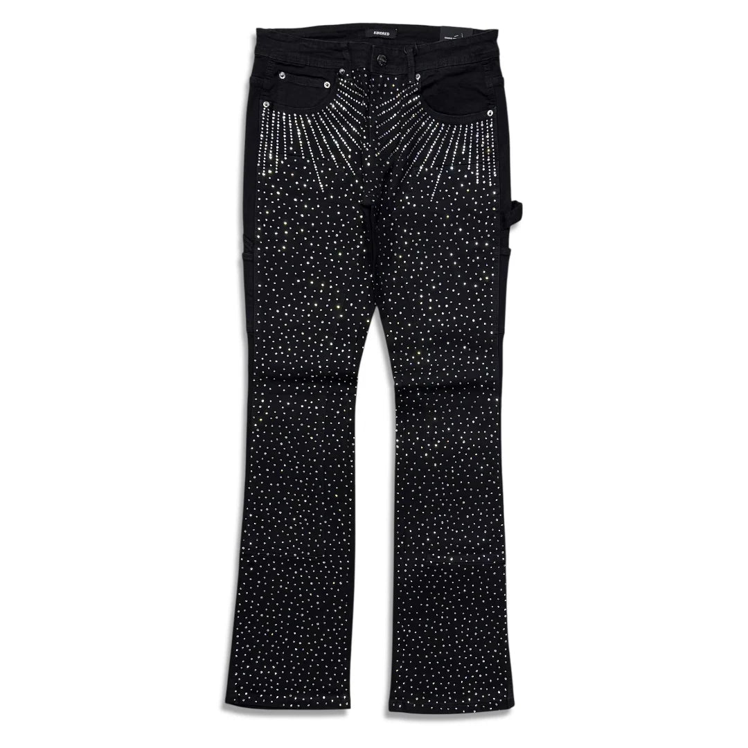 Make a bold statement with the Men's Rhinestone Denim Stacked Jeans in Black Kindred. Designed with a stacked fit, these jeans feature rhinestone detailing that adds standout style to any look. The sleek black finish makes them versatile for both casual and elevated outfits. A perfect choice for modern streetwear with a touch of edge.