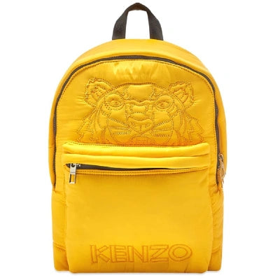 Make a bold statement with the KENZO Backpack in Yellow Gold, a modern fusion of luxury craftsmanship and urban edge. 