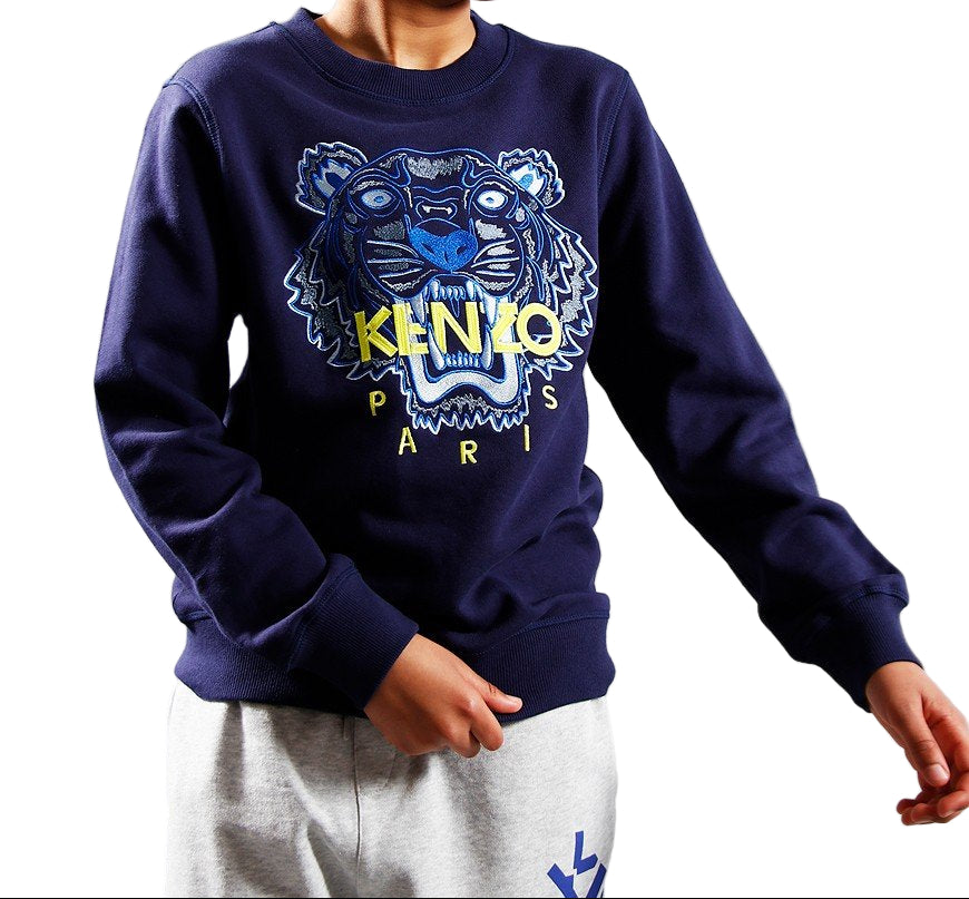 Unleash bold style with the KENZO Kids Tiger Face Sweatshirt (Navy) — a statement piece that captures the essence of KENZO’s legendary street-luxury aesthetic. 